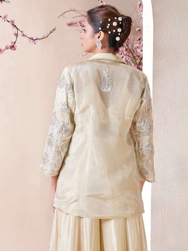 Attractive cream tissue silk palazzo salwar suit