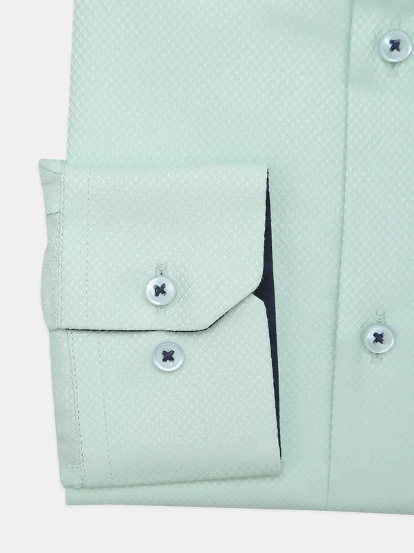 Avega presented pista green textured cotton shirt