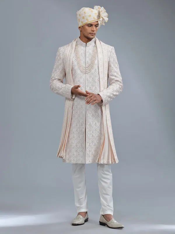 Awesome light peach raw silk sherwani for groom