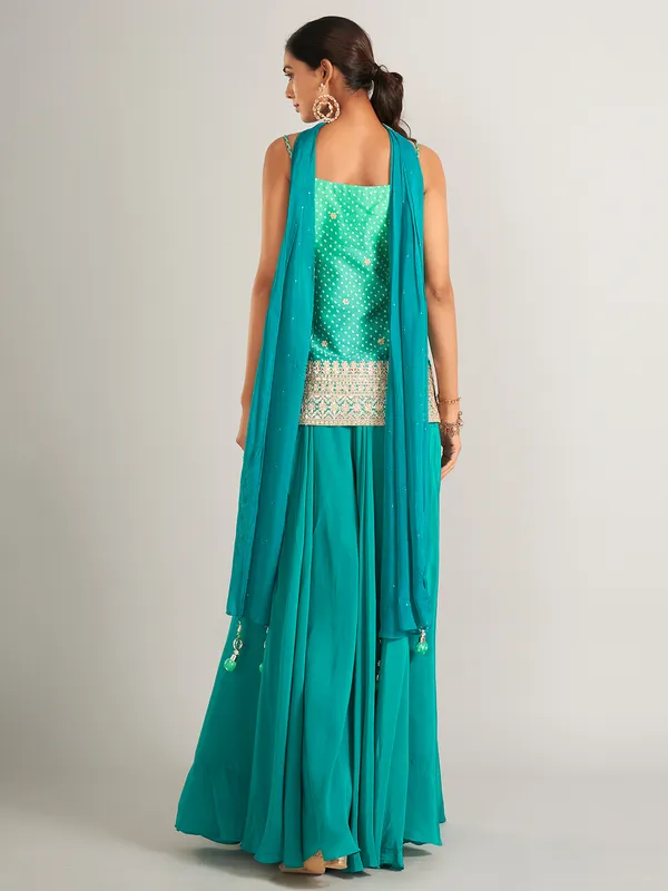 Bandhani print silk rama green palazzo salwar suit