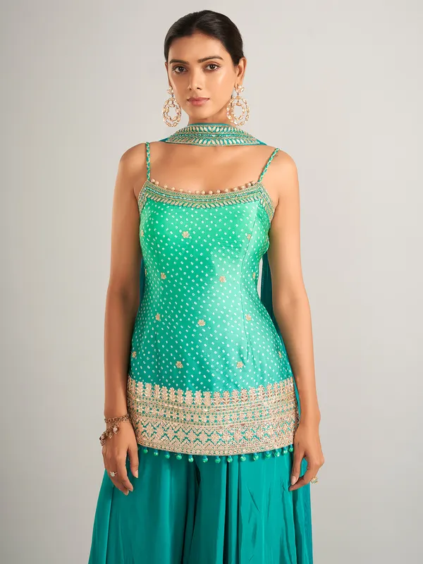 Bandhani print silk rama green palazzo salwar suit