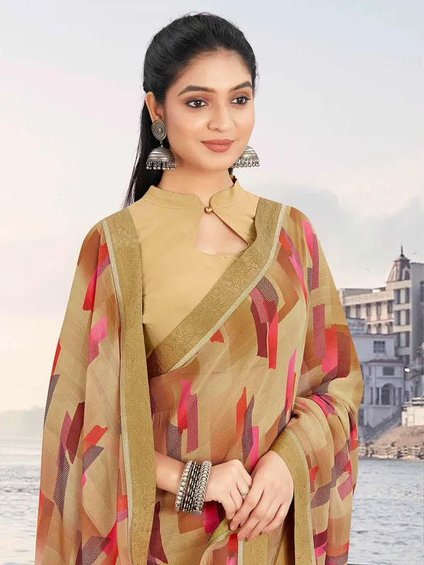 Beautiful beige printed georgette saree