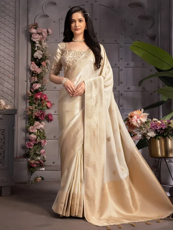 Beautiful cream tissue silk saree