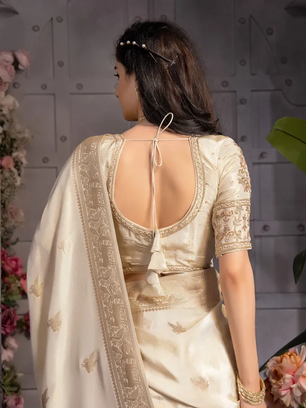 Beautiful cream tissue silk saree