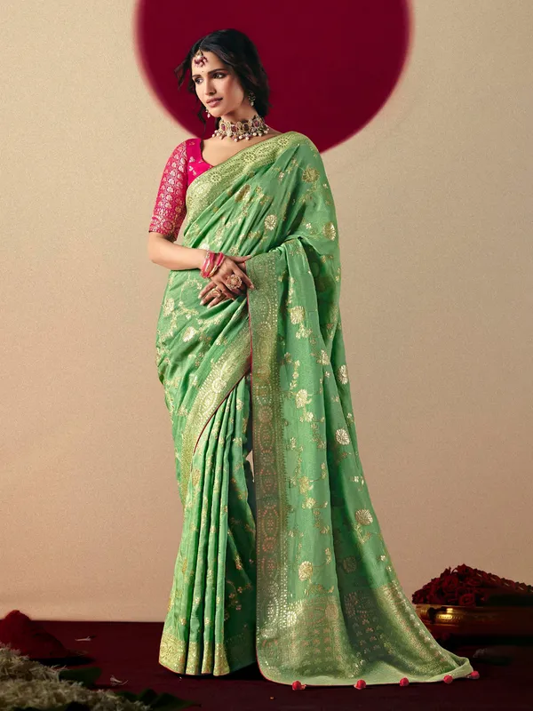 Beautiful green dola silk saree for festive