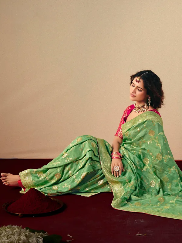 Beautiful green dola silk saree for festive