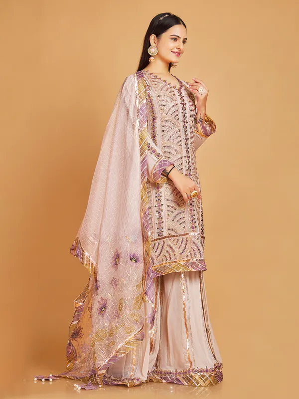 Beautiful light pink georgette sharara suit