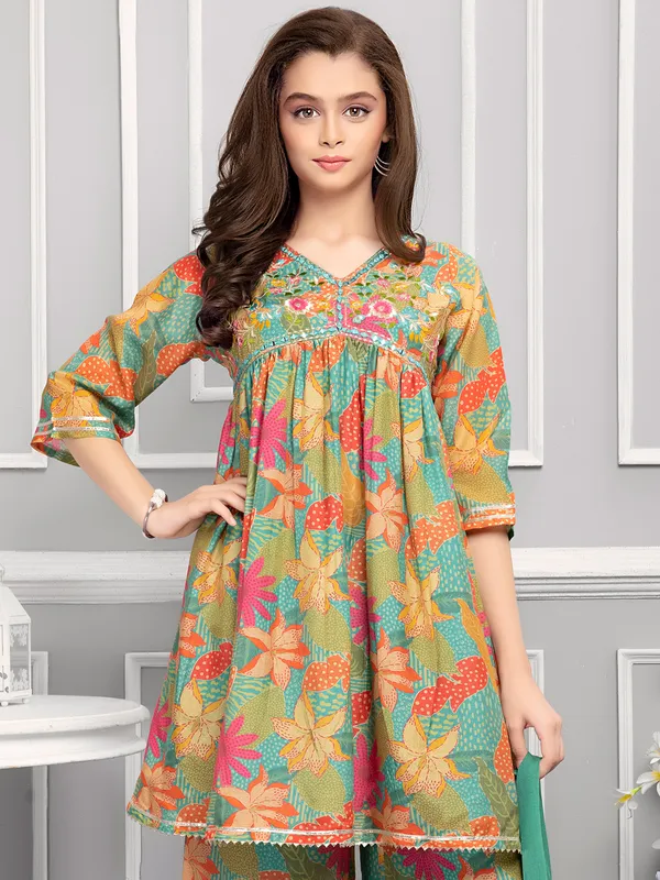 Beautiful printed pista green silk palazzo salwar suit
