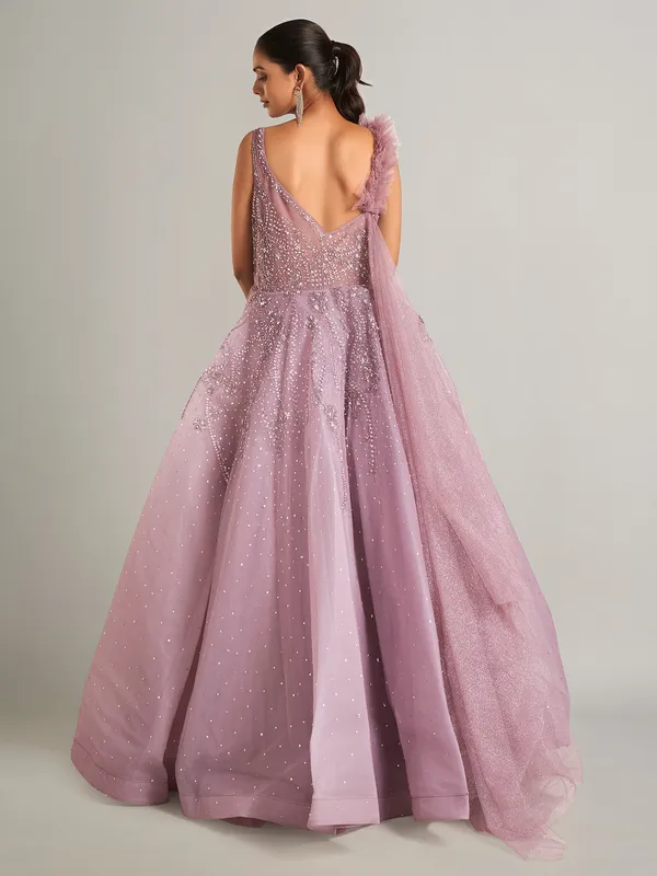 Beautiful purple net gown for party wear