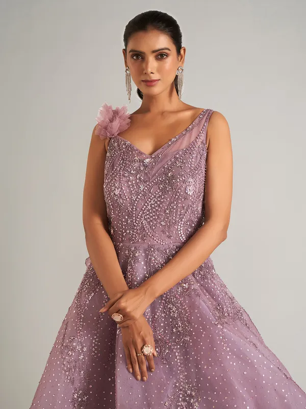 Beautiful purple net gown for party wear