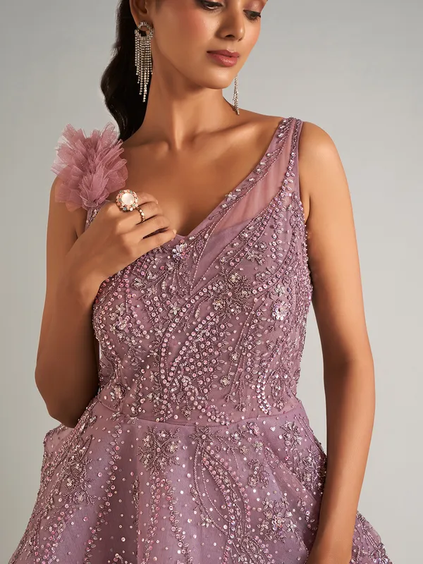 Beautiful purple net gown for party wear