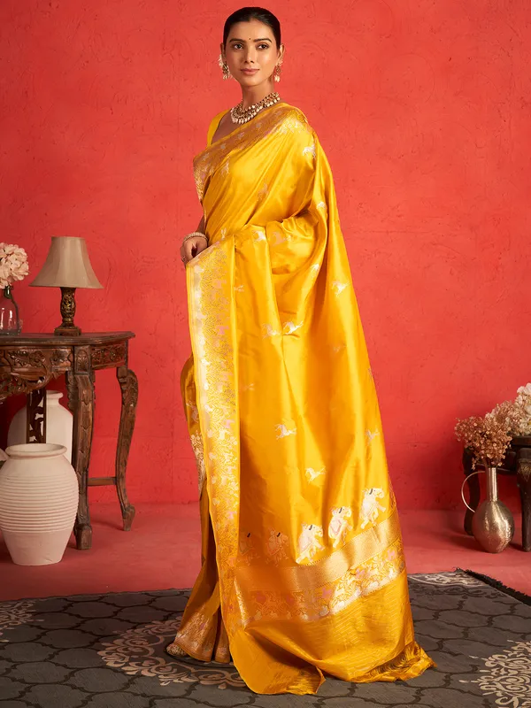 Beautiful yellow saree with zari work