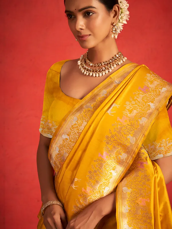 Beautiful yellow saree with zari work