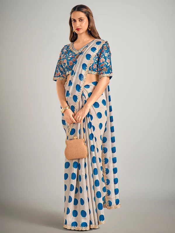 Beige and blue crepe silk saree