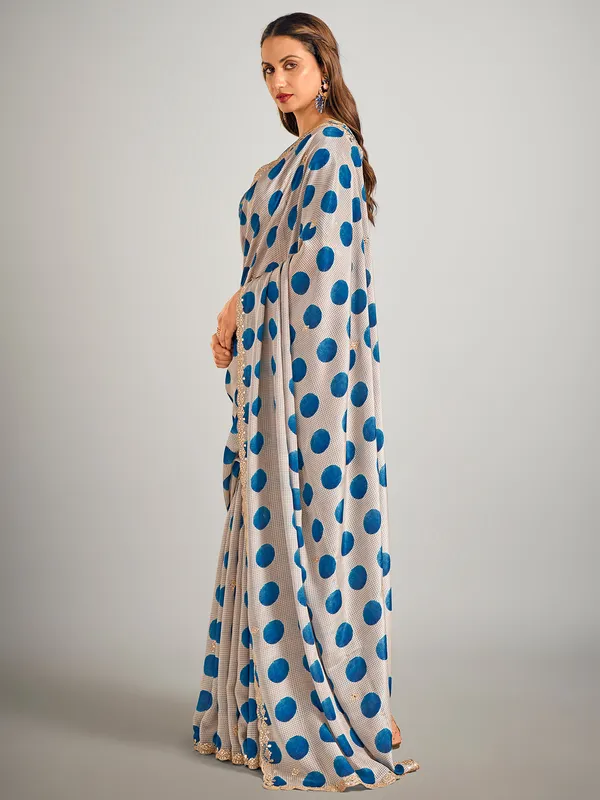 Beige and blue crepe silk saree