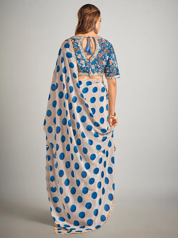 Beige and blue crepe silk saree