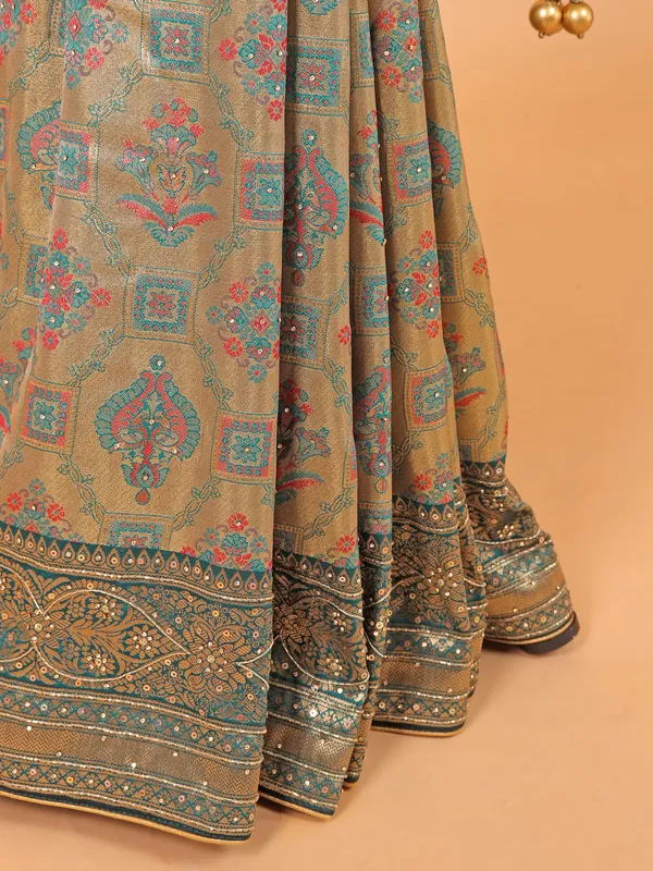 Beige and green dola silk wedding wear saree