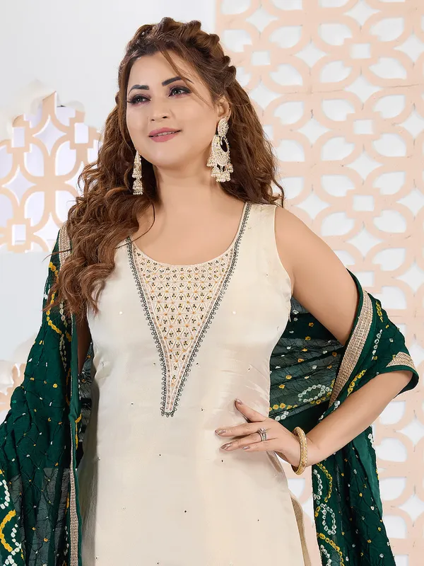 Beige and green silk salwar suit with dupatta