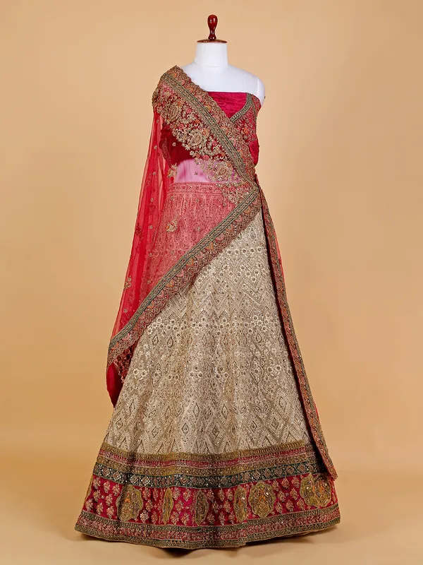 Beige and maroon net bridal lehenga choli