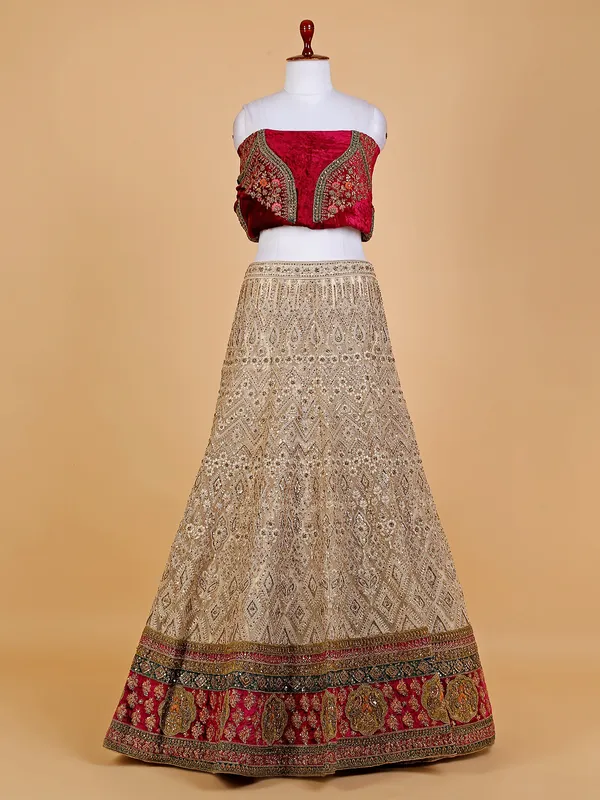 Beige and maroon net bridal lehenga choli