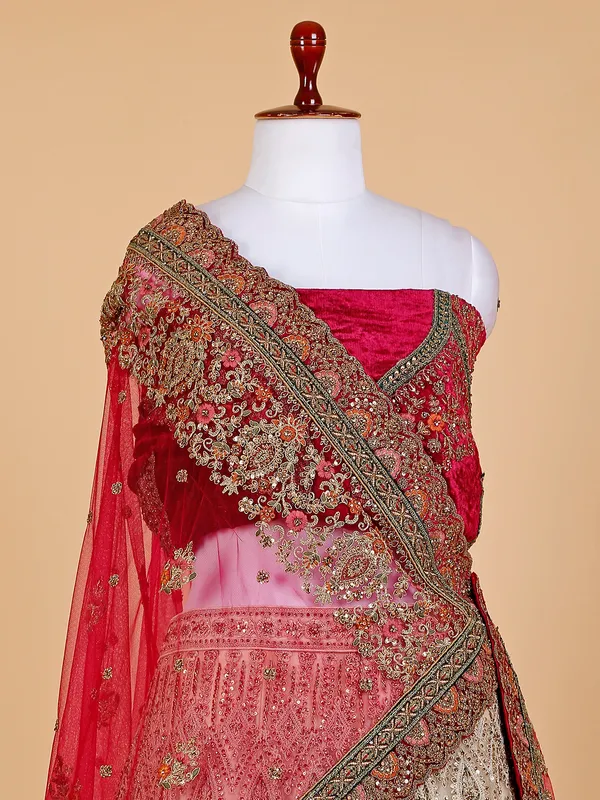 Beige and maroon net bridal lehenga choli