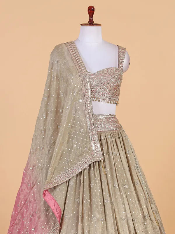 Beige and pink shaded georgette lehenga choli