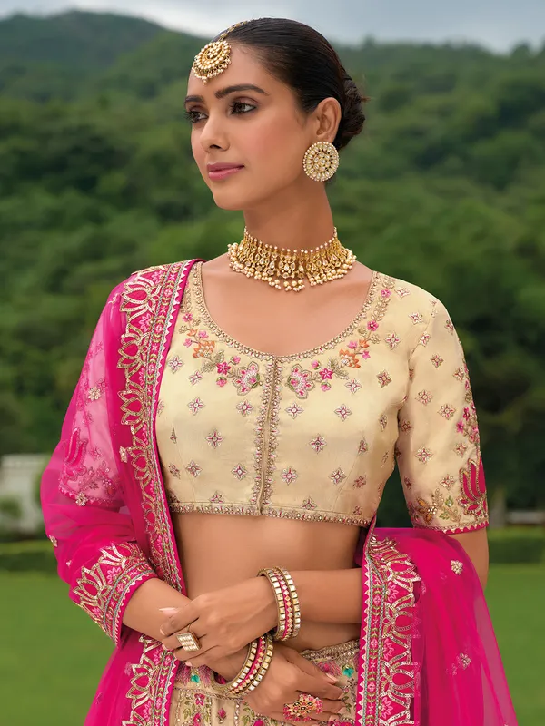 Beige and rani color silk lehenga choli