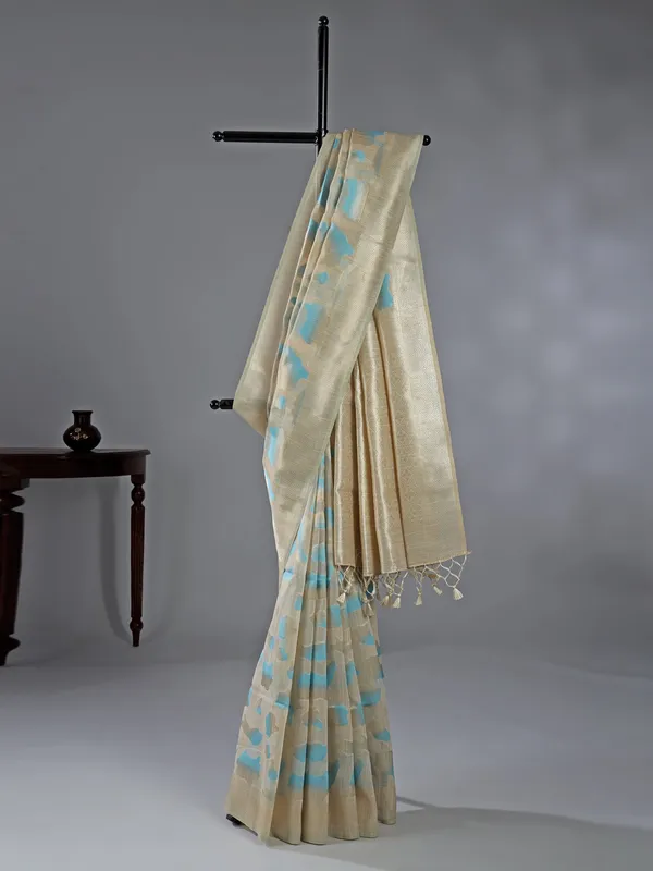 Beige and sky blue semi cotton saree for festive wear