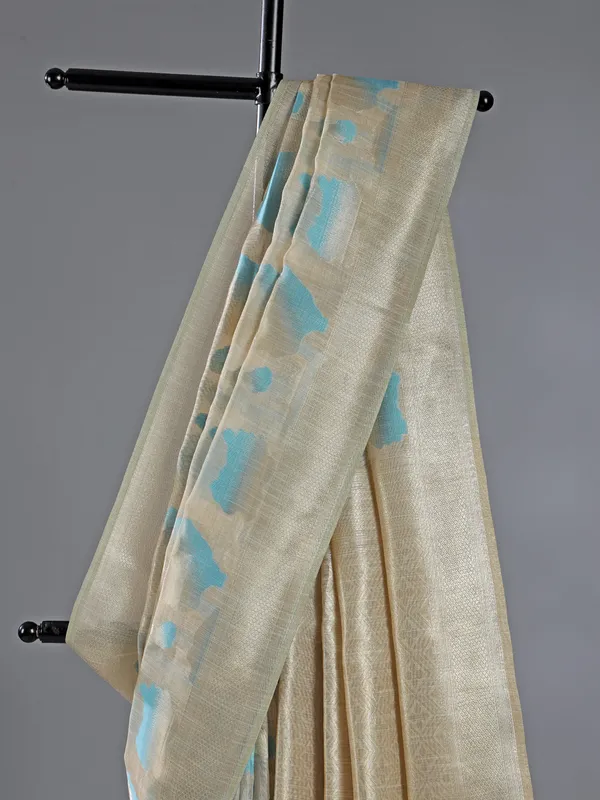 Beige and sky blue semi cotton saree for festive wear
