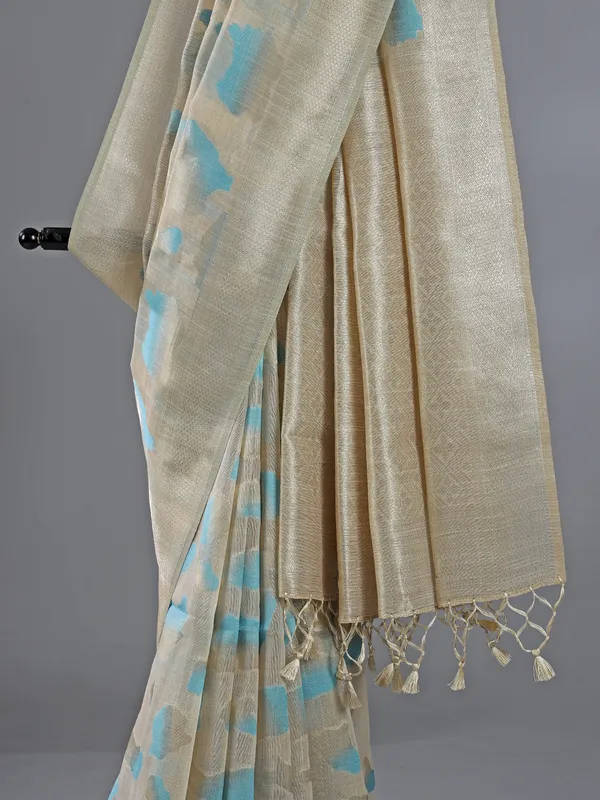 Beige and sky blue semi cotton saree for festive wear