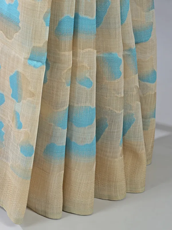 Beige and sky blue semi cotton saree for festive wear