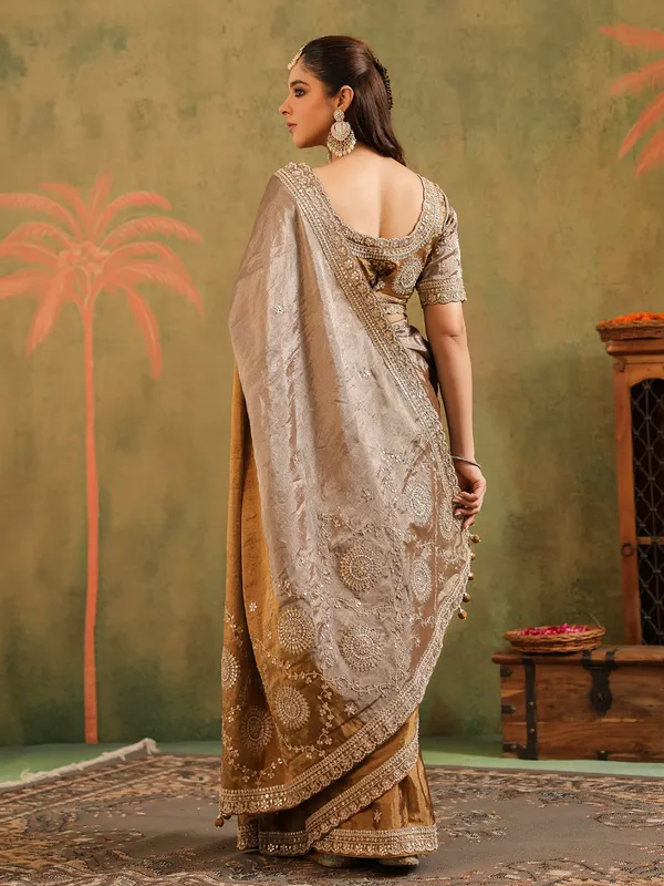 Beige brown tissue silk saree with rich embroidery