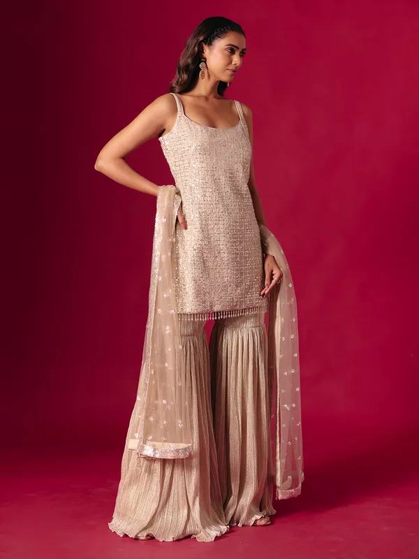 Beige chiffon sharara suit with dupatta
