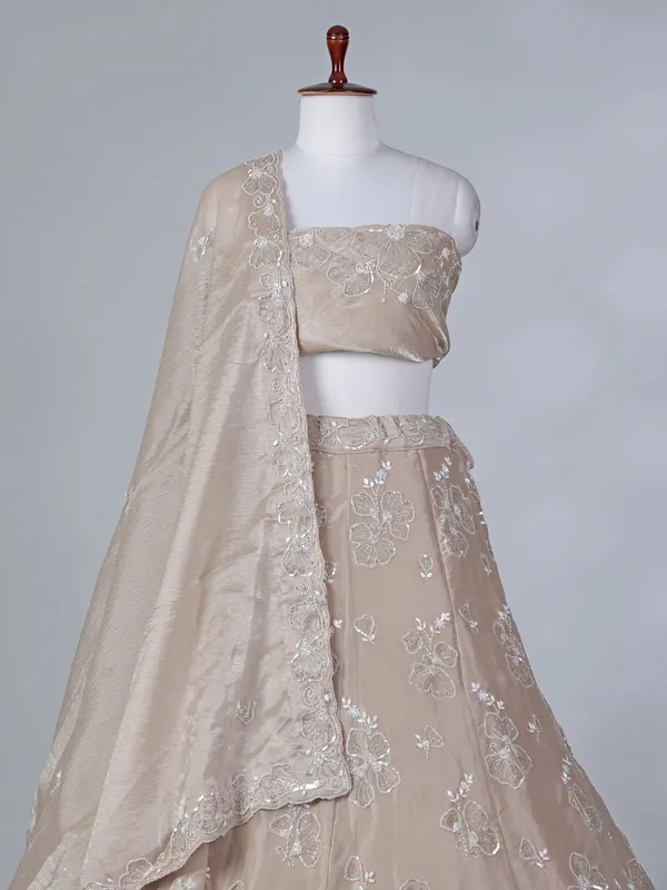 Beige chiffon unstitched lehenga choli with zardosi work