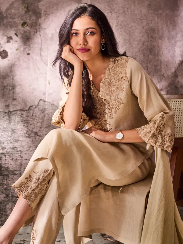 Beige cotton festive wear kurti set with embroidery