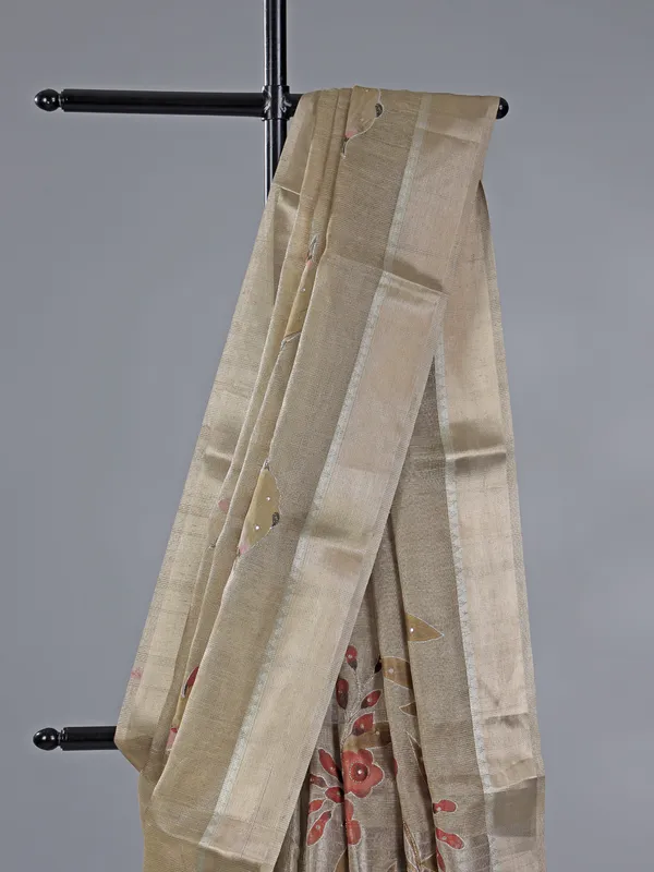 Beige cotton silk saree with festive detailing