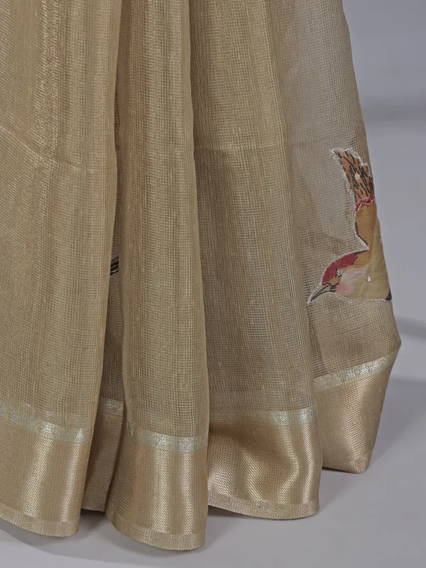 Beige cotton silk saree with festive detailing