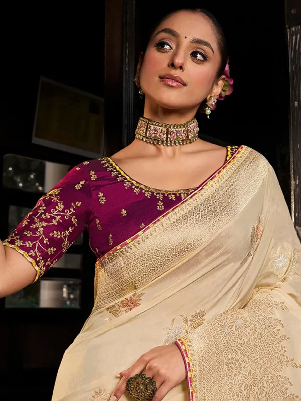 Beige dola silk saree with contrast blouse