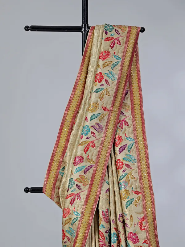 Beige dola silk saree with florals colorful motifs