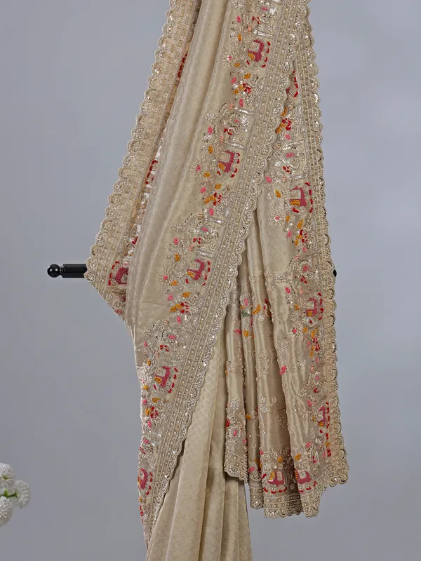 Beige dola silk saree with zari work
