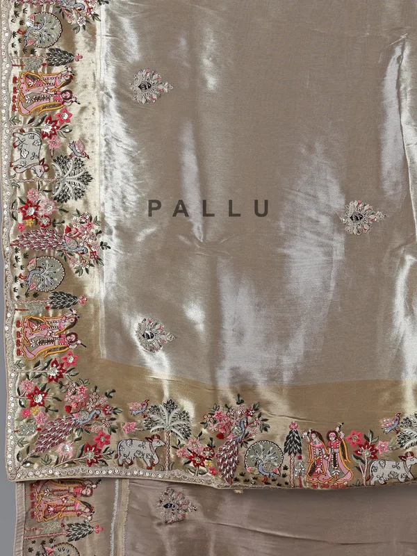 Beige embroidered tissue silk saree