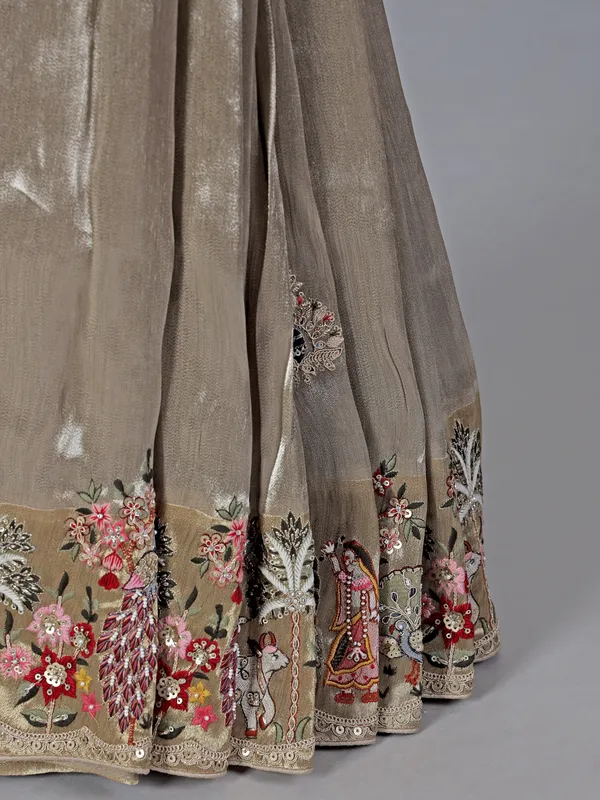 Beige embroidered tissue silk saree