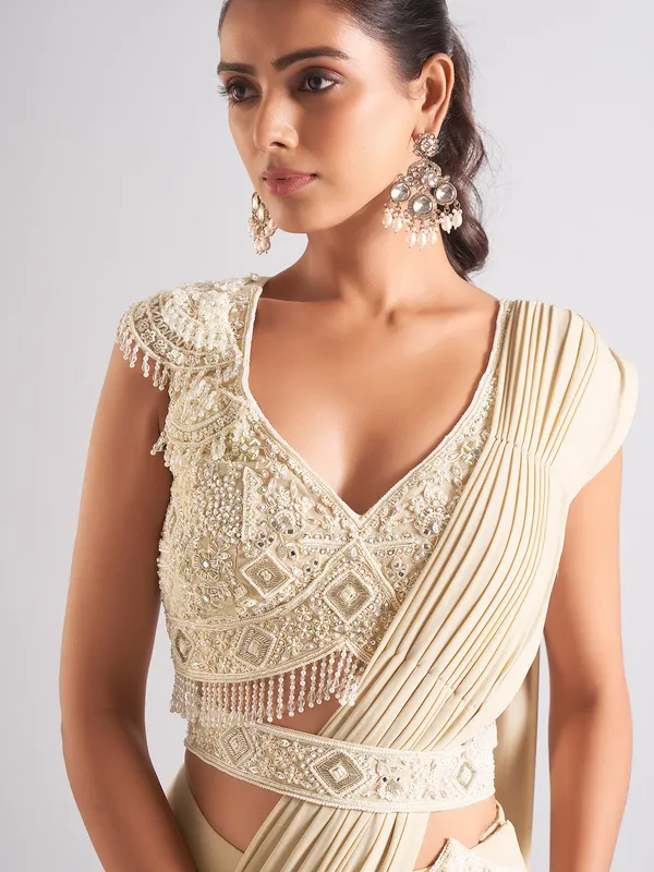 Beige georgette saree for party wear
