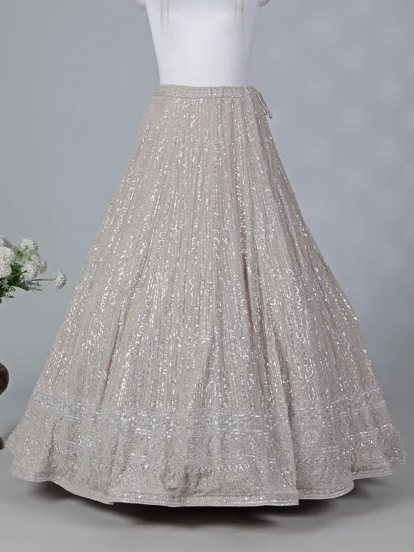 Beige georgette sleeveless lehenga choli