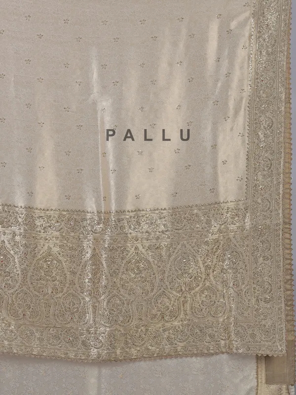Beige kanjivaram silk saree with zari weaving