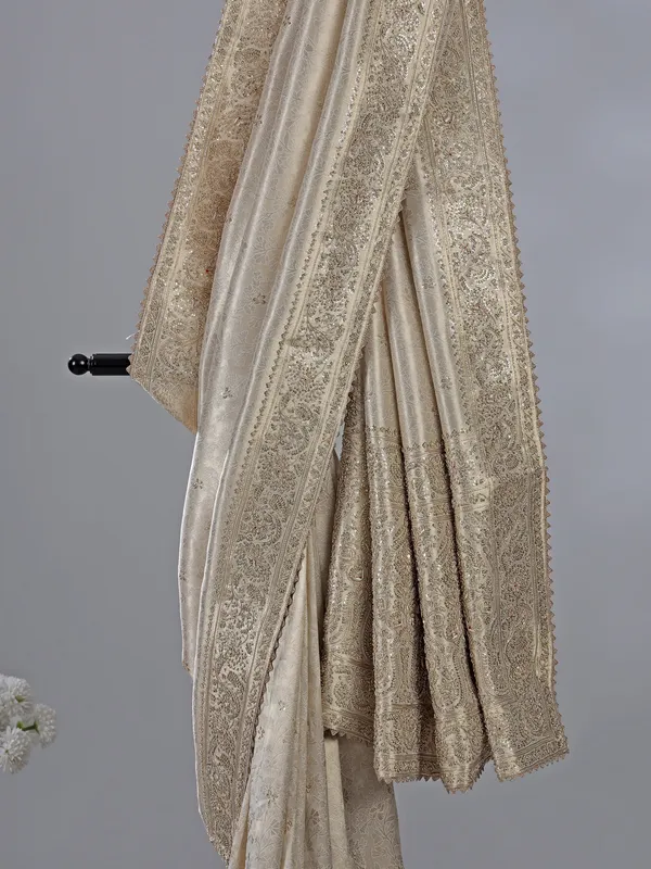 Beige kanjivaram silk saree with zari weaving