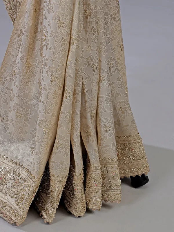 Beige kanjivaram silk saree with zari weaving