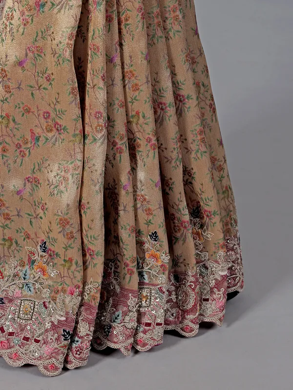 Beige kanjivaram with colorful motifs saree