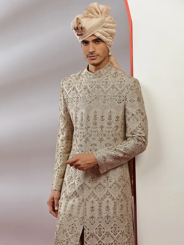 Beige lavish groom wear raw silk sherwani