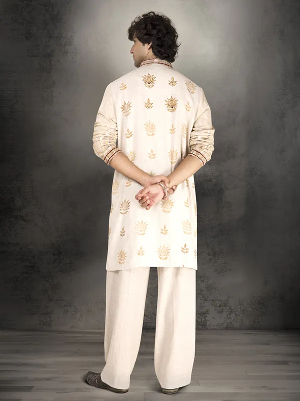Beige linen cotton printed thread and cutdana kurta suit